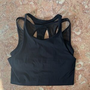 Lululemon black tank size 8 with mesh detail and built in bra